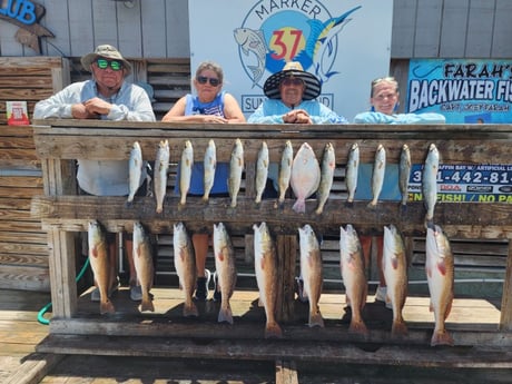 Flounder, Redfish, Speckled Trout Fishing in