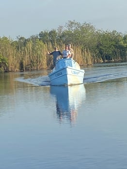 Boat photo for West Palm Iguana Hunting