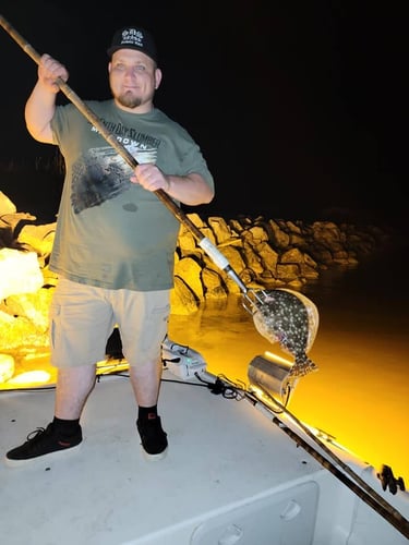 Gig & Grin: Flounder Fun In Dauphin Island