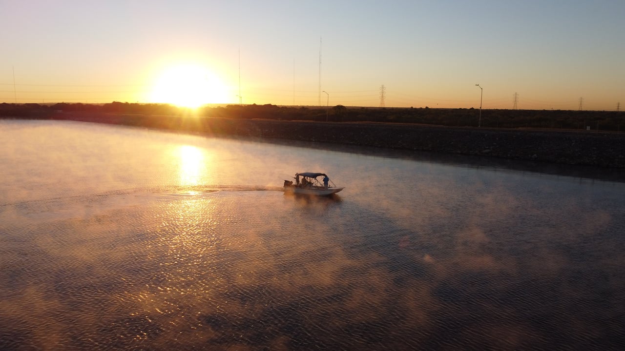 boat moving in fog on lake in texas
