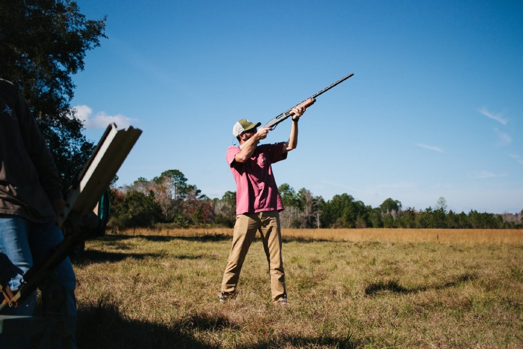 Man Shooting a shotgun