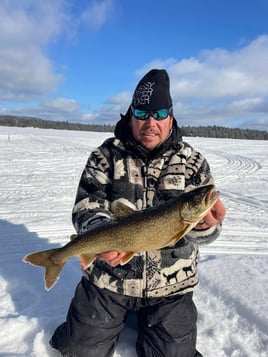 Ice Fishing In North Woods