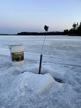 Ice Fishing In North Woods
