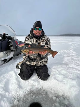 Ice Fishing In North Woods