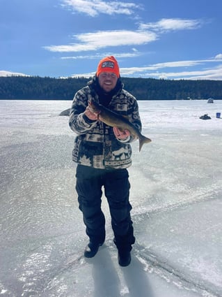 Ice Fishing In North Woods