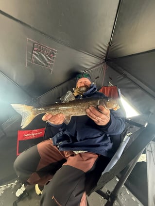 Ice Fishing In North Woods
