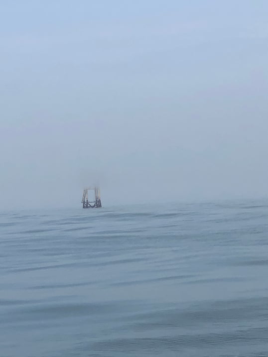 oil rig in fog