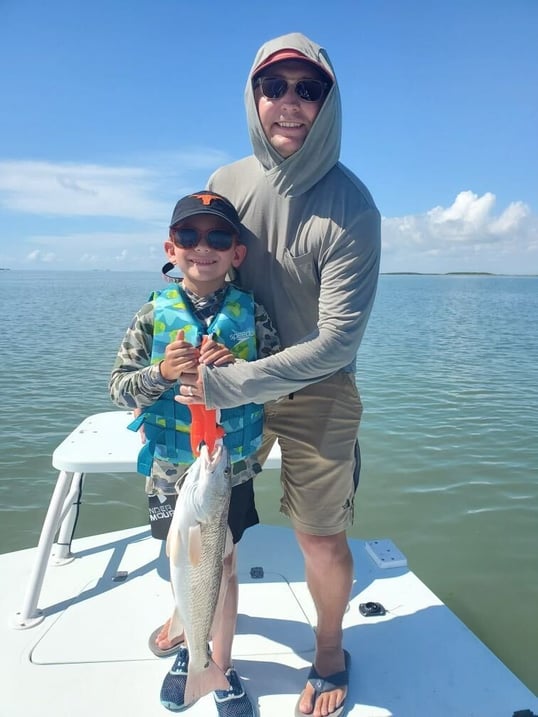 Sons First Redfish