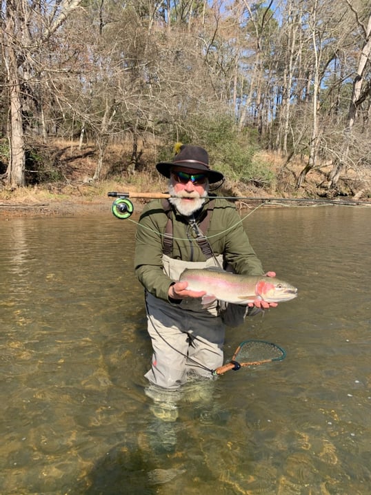 Kit Brown With a Trout