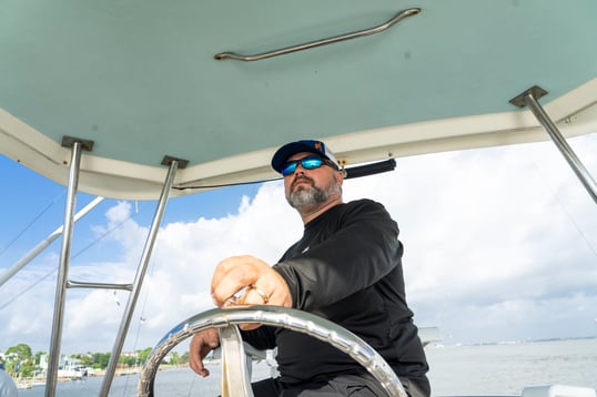 Captain Operating the Boat
