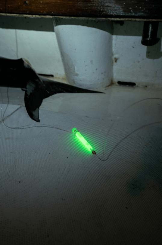 Glowsticks on the deck of a boat