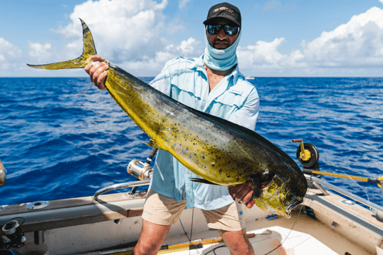 Holding up a mahi in tanzania