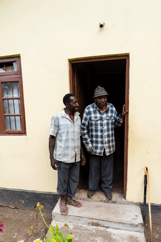 Man and his father near kilimanjaro