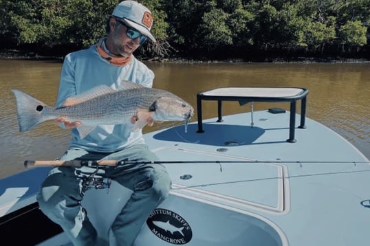 Captain Ryan Catching Redfish On Light Tackle